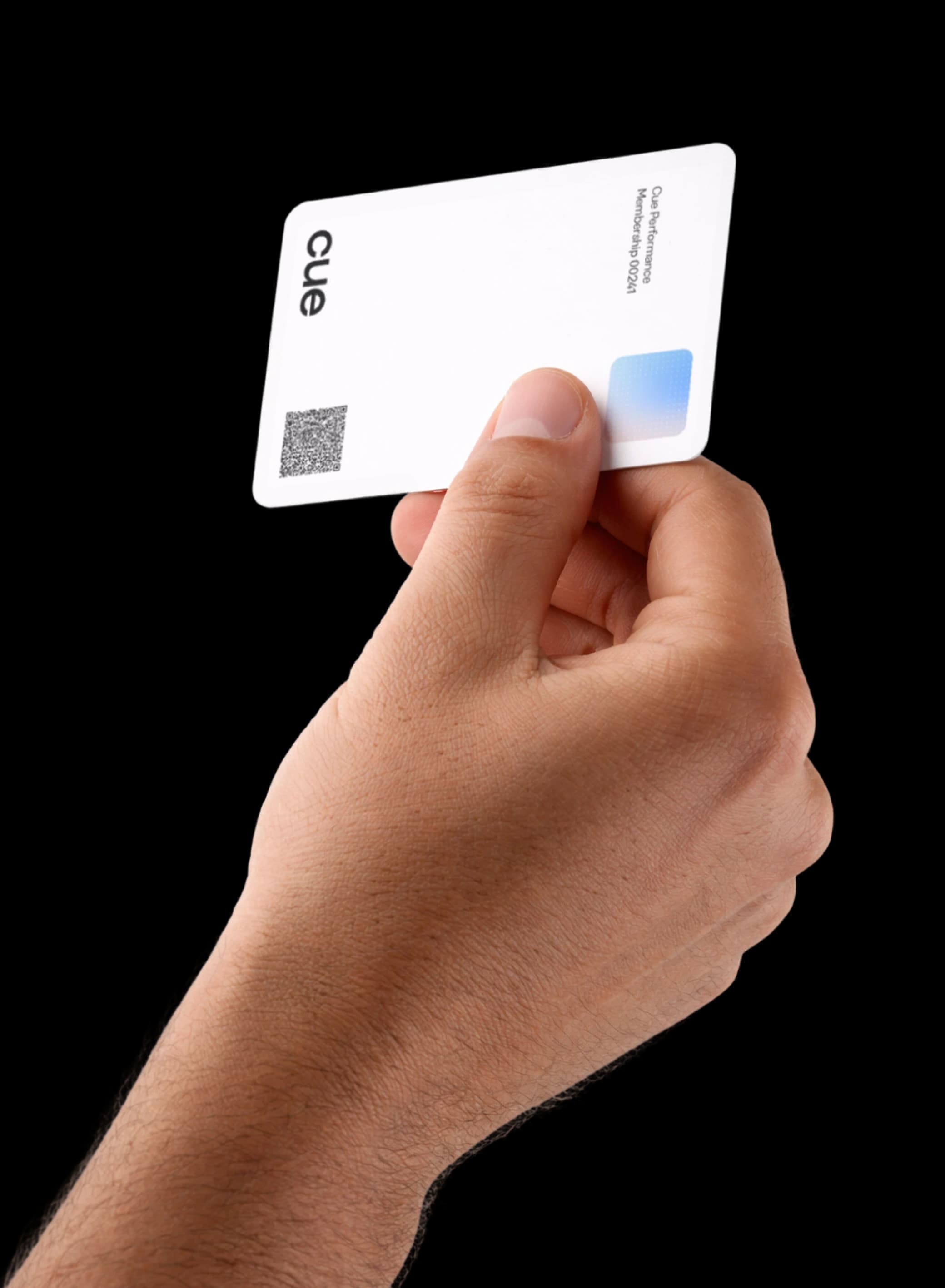 Hand holding a Cue card